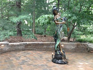 Statue on Paver Patio with Retaining Wall